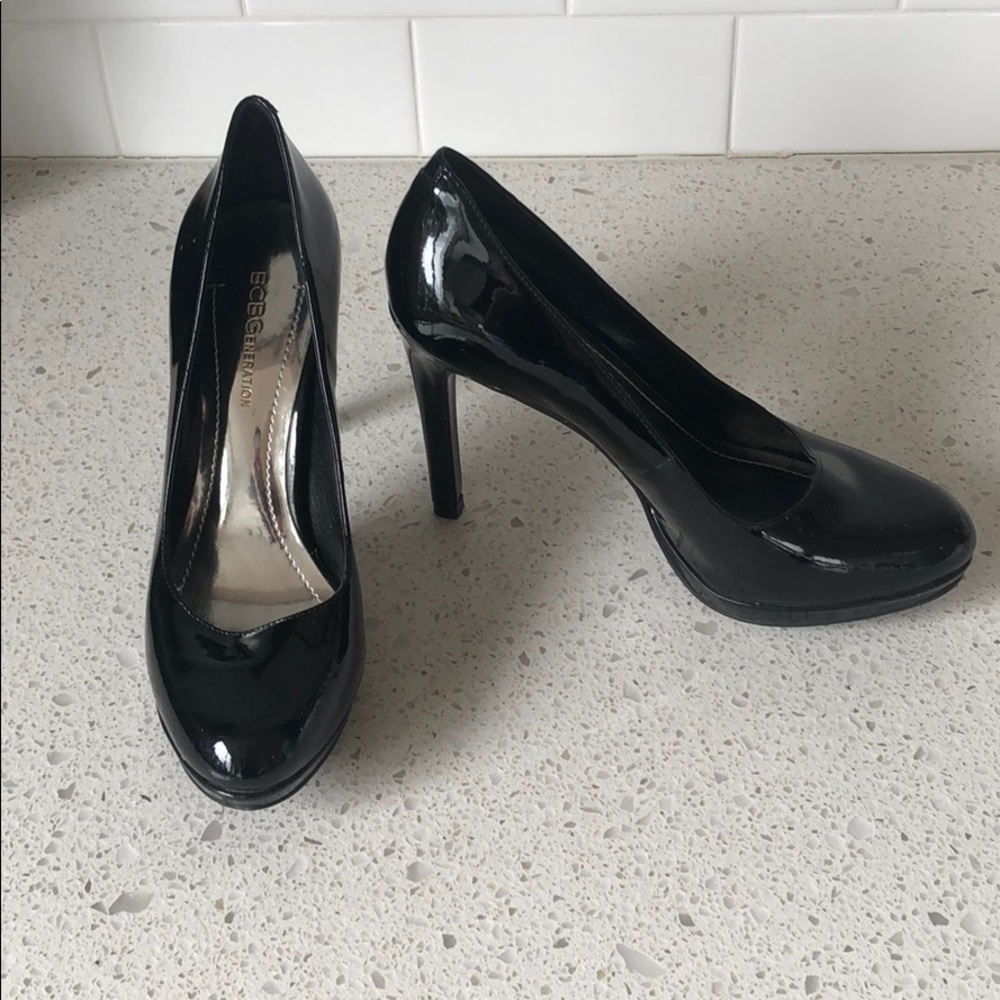 BCBG black never worn black pumps